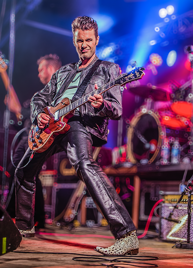 Zelimir playing guitar live on stage